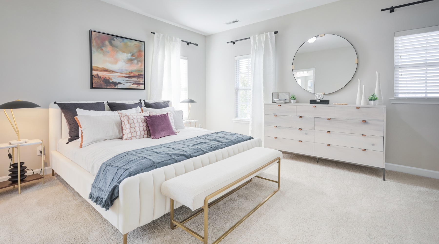 Bedroom with modern décor at Charleston Row townhomes for rent in Charlotte, NC